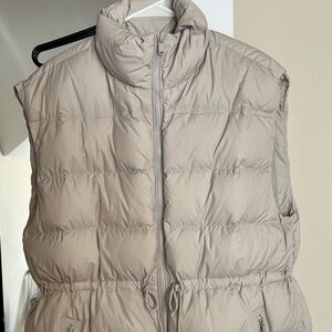 Athleta cream colored vest jacket cinched at the waist line